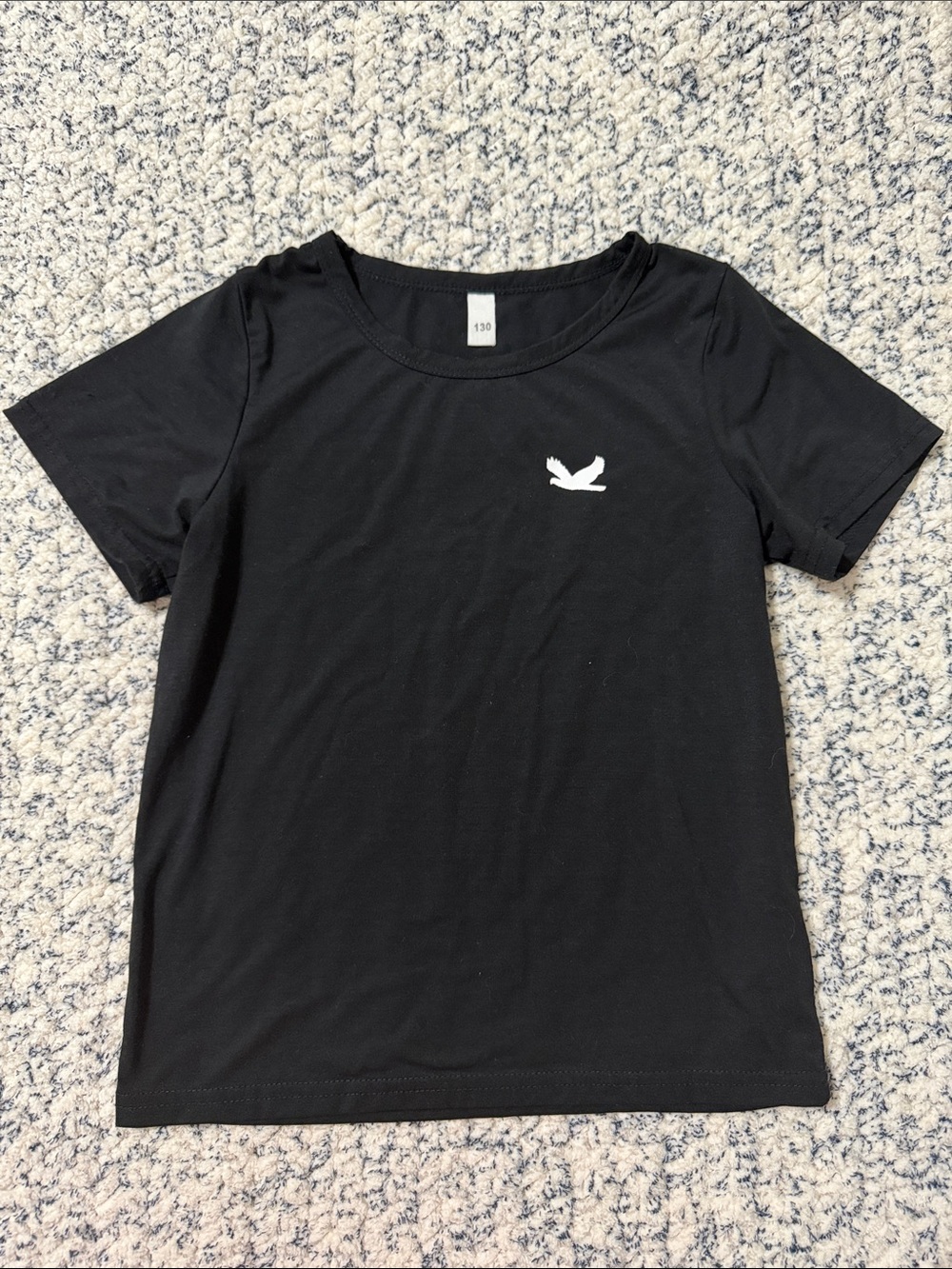 Black Short Sleeve Women's Tee with Small White Dove Logo